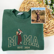 Green sweatshirt with 'MAMA EST. 2024' design and a photo of a woman holding a baby.